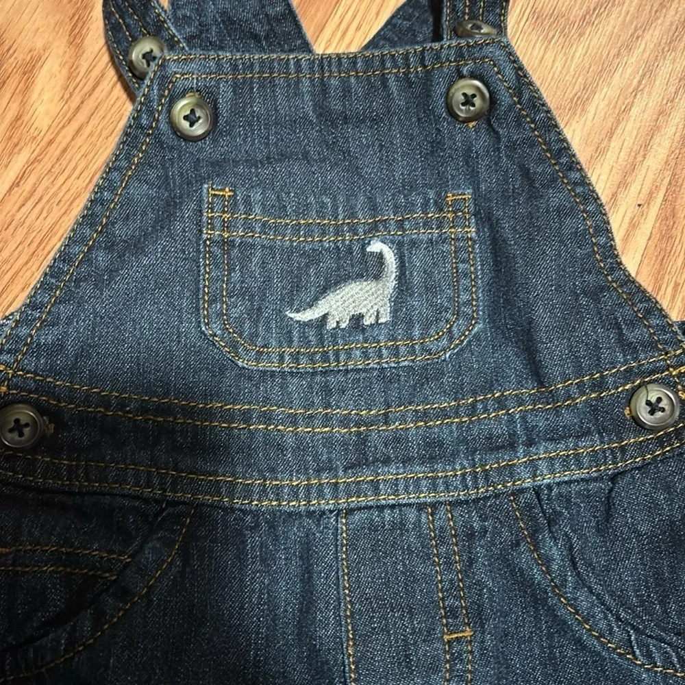 Carters dinosaur blue Jean overalls/ suspenders 9 months shorts